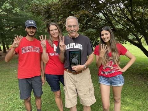 Alissa Arford and her family posing together in Maryland gear.