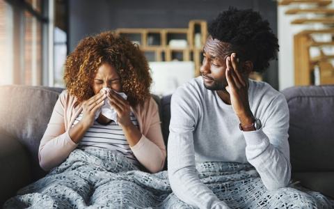 Couple on the Sofa with a Cold 0