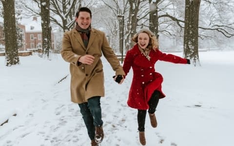 Dan and Brooke running through the snow