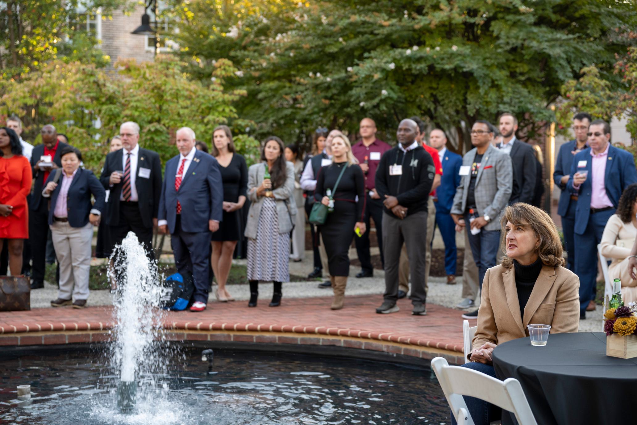 Volunteer Leaders listen intently during the Volunteer Awards ceremony at the Riggs Alumni Center Gardens