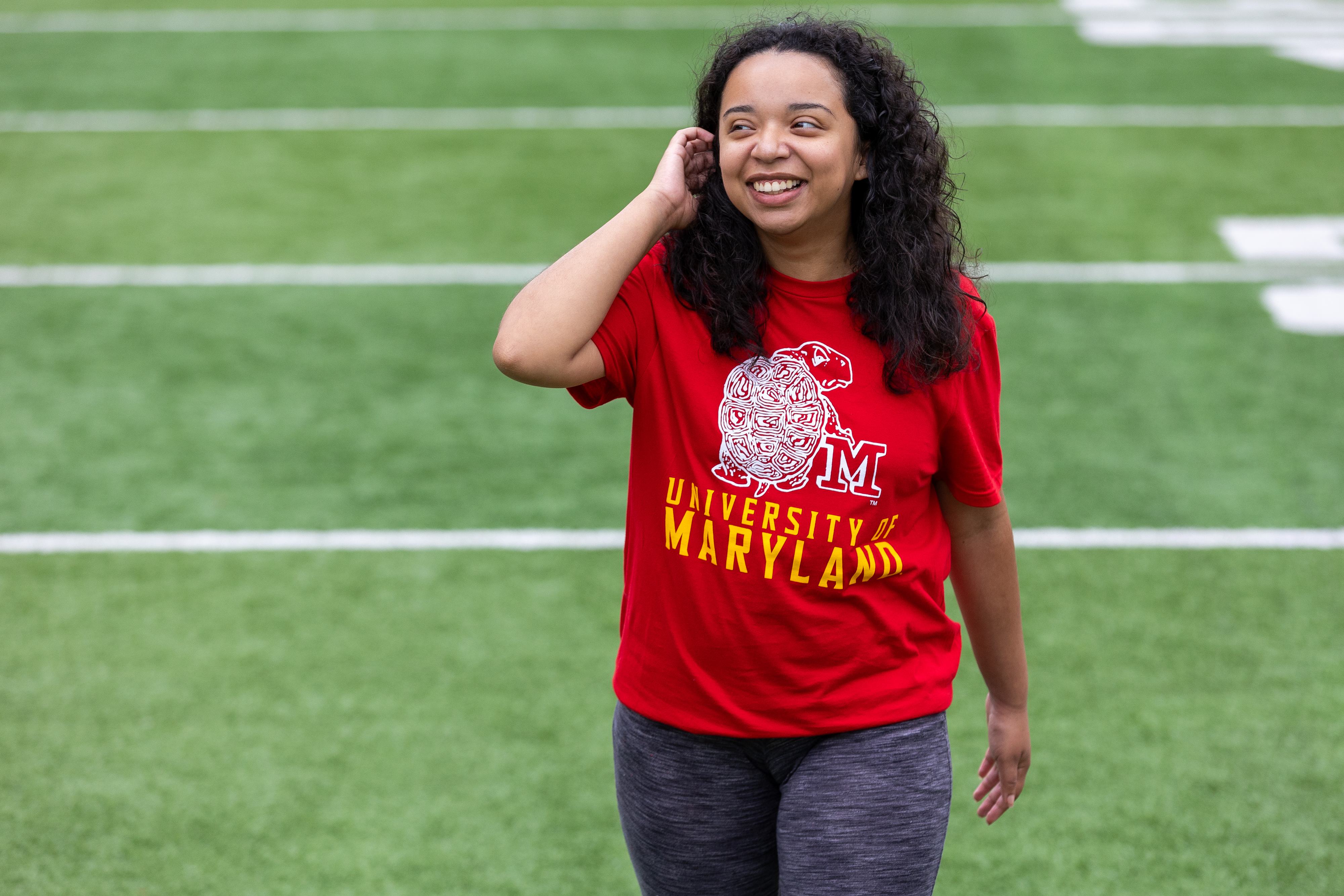 Alum walking on the field, sporting the retro Testudo design