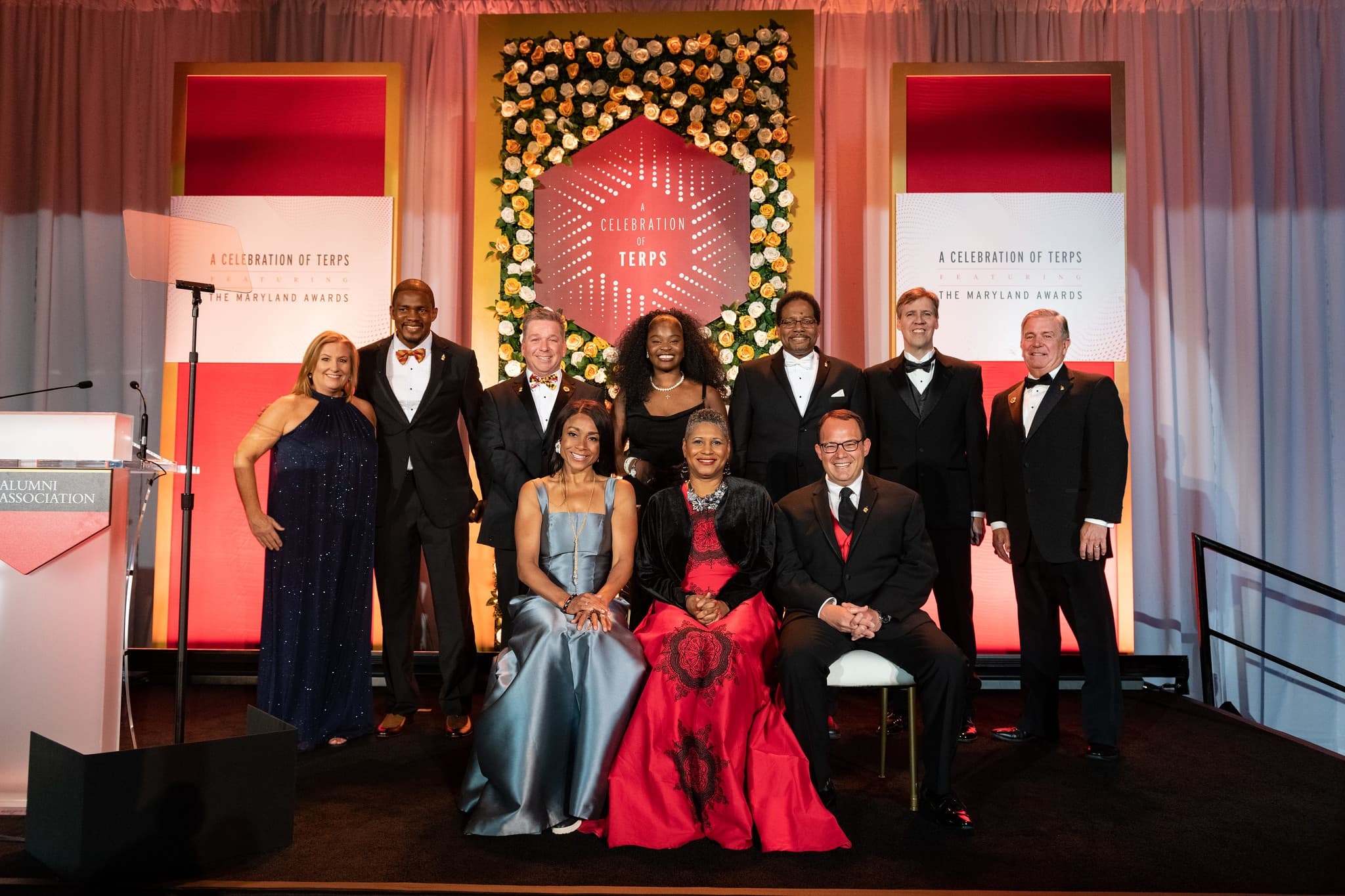 2022 Awardees standing together in their best black-tie attire after receiving their respective awards as part of A Celebration of Terps.