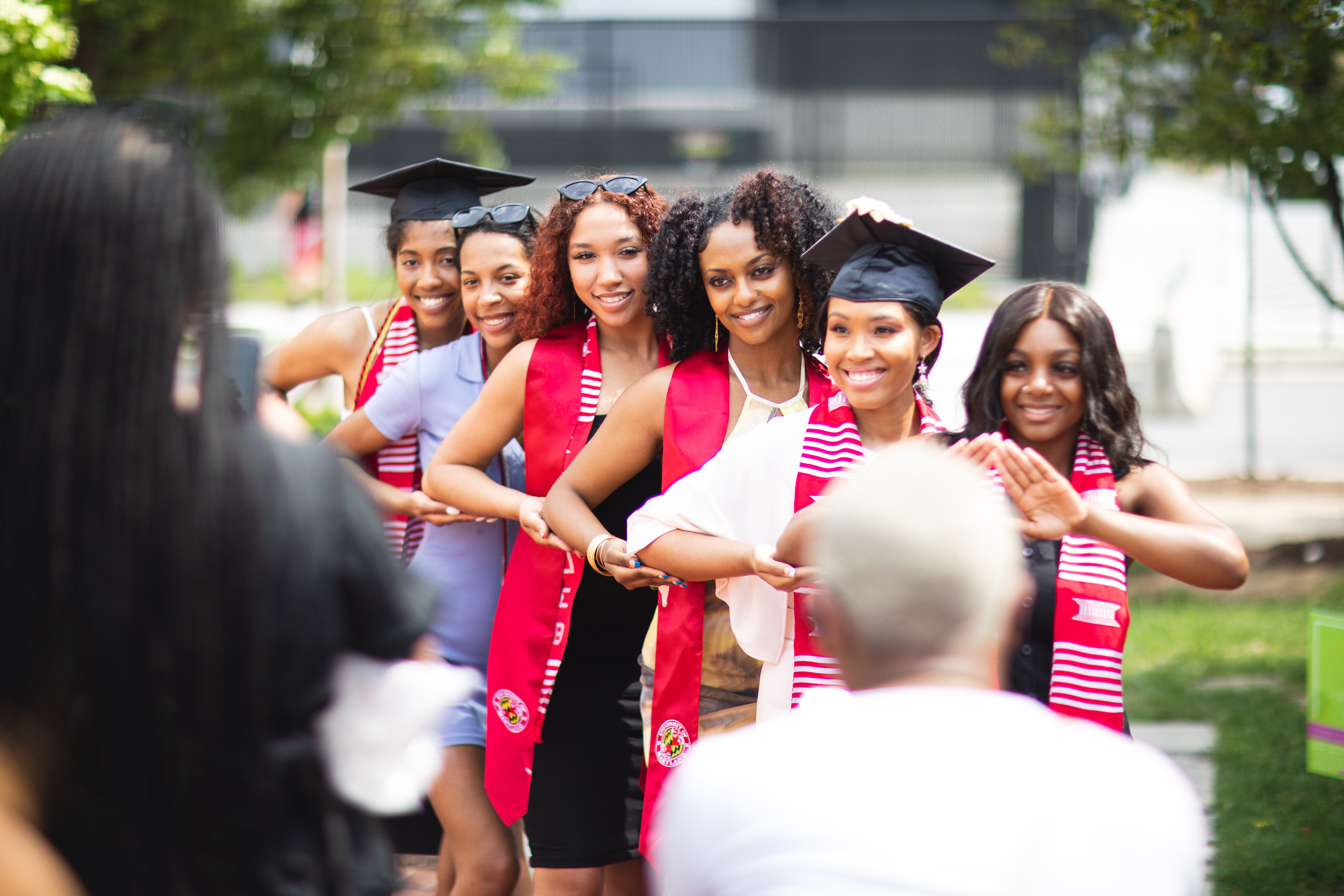 May 2022 graduates celebrate at the Alumni Association's Commencement Celebration in Moxley Gardens.