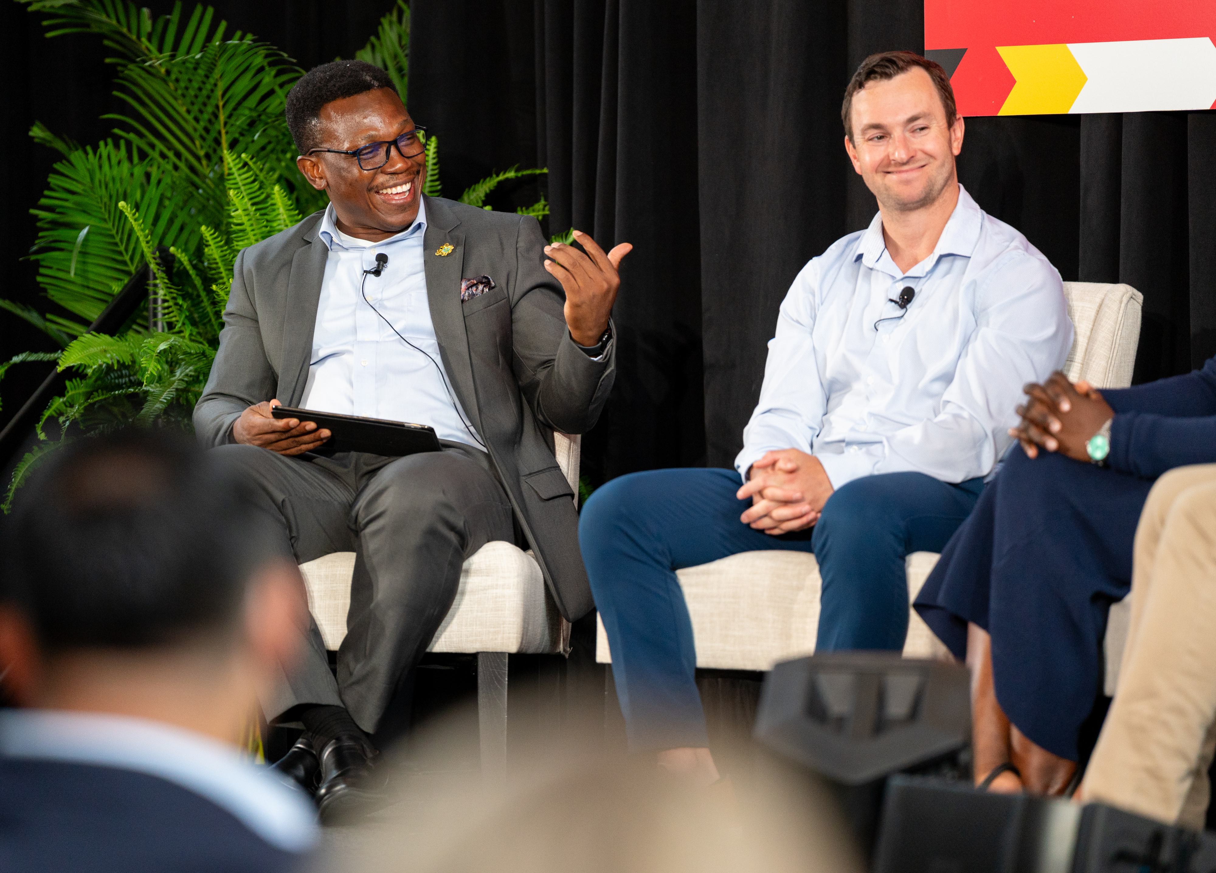 Anani Yao Kukwornu Ph.D. '27 (right) and Evan Lutz ‘14, founder of Hungry Harvest (left) speak at an Alumni Association panel.