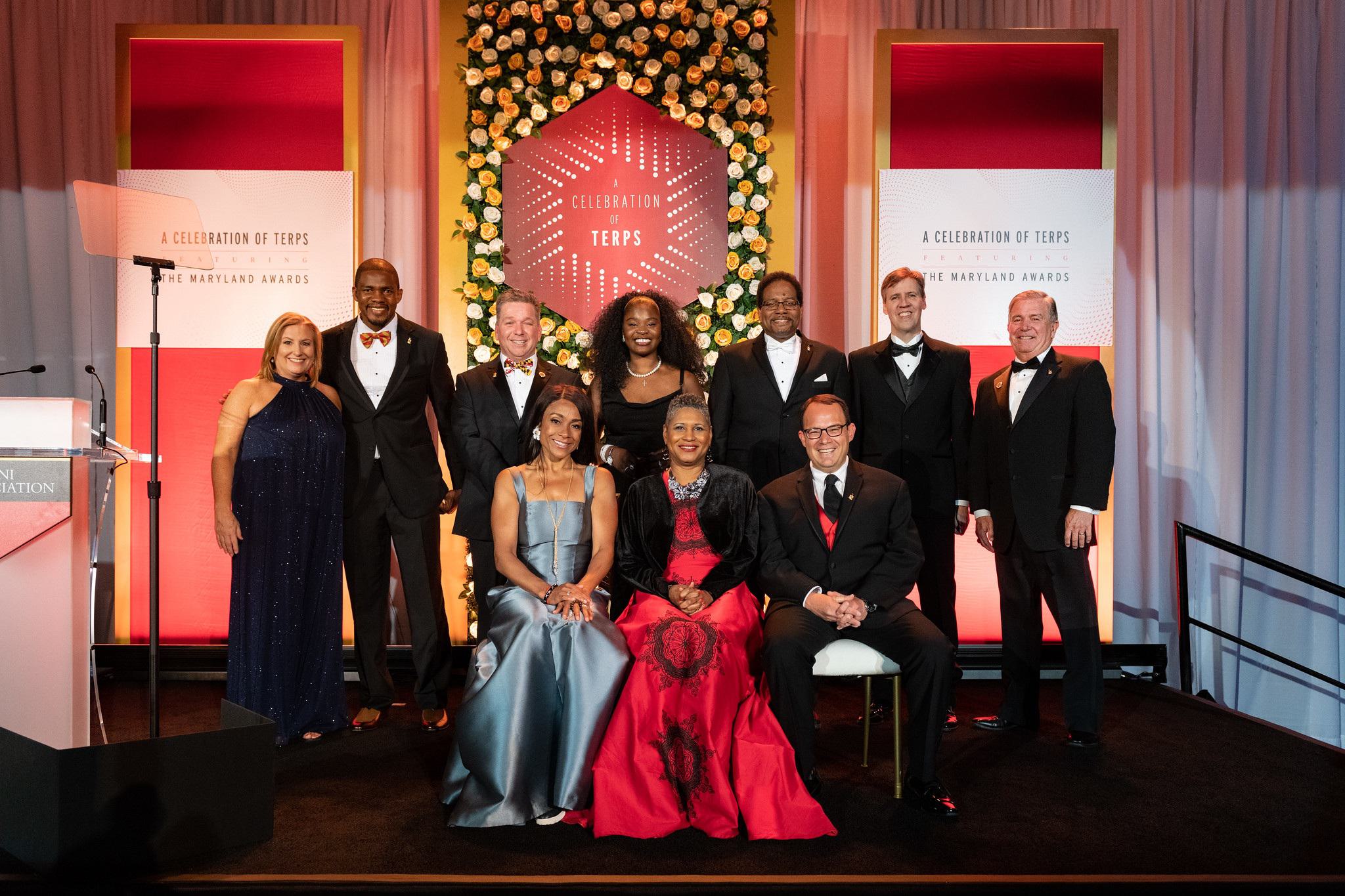 Individuals gathered with President Pines in formal wear for A Celebration of Terps: Featuring the Maryland Awards.