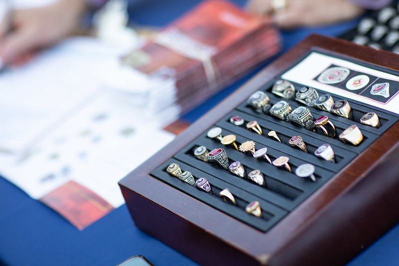 An assortment of University of Maryland class rings.