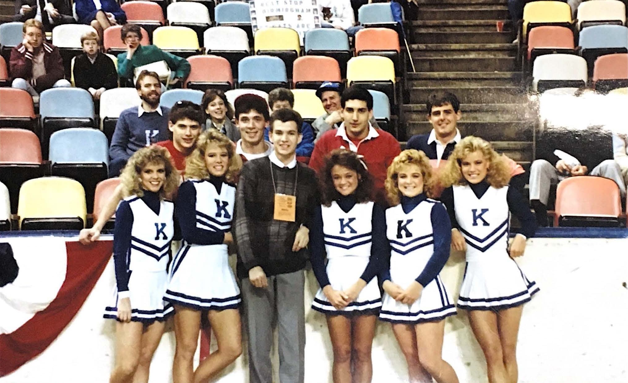 Jim Perrus, center, with a group of cheerleaders at the 1988 NCAA Tournament