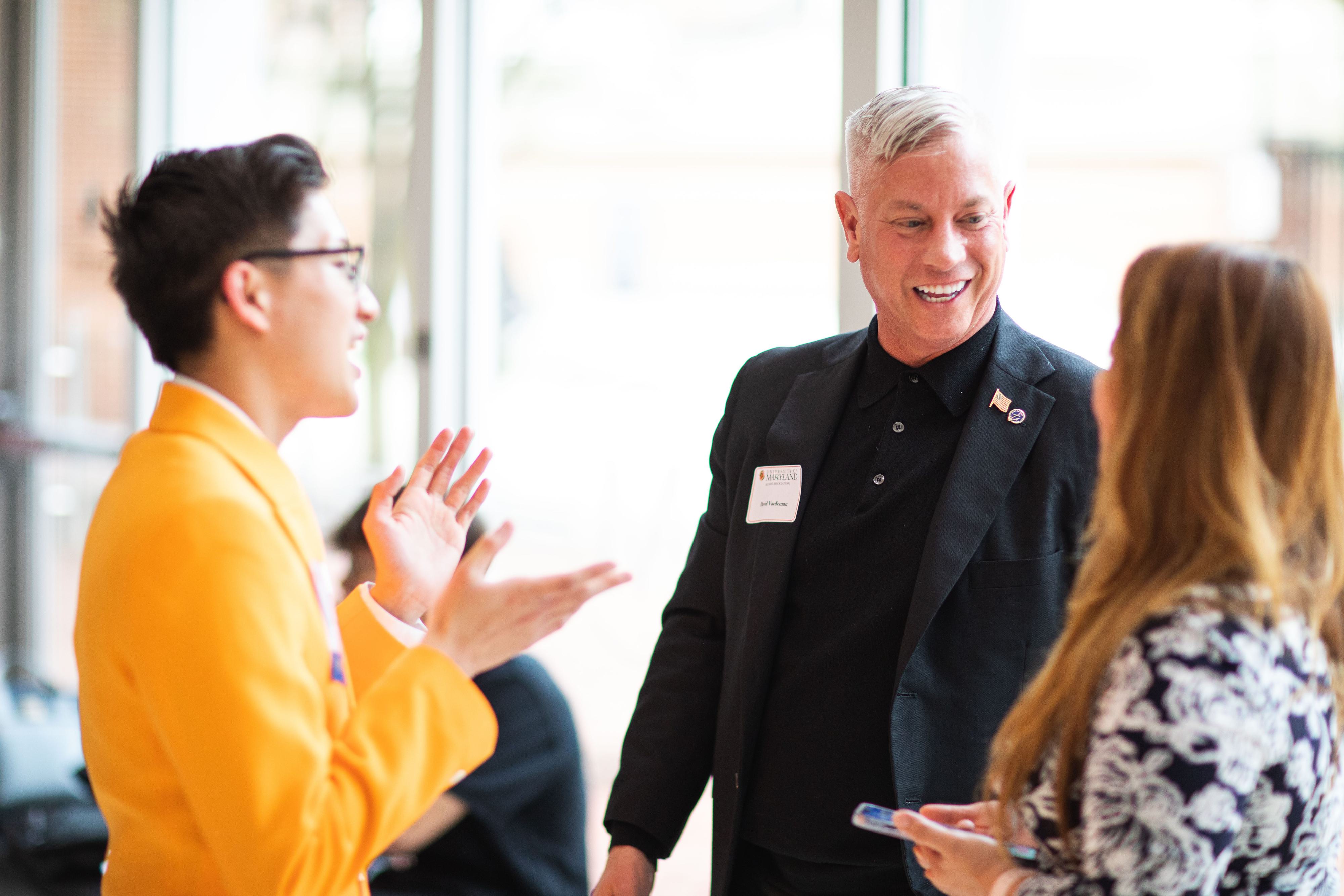 Mentors speaking to students