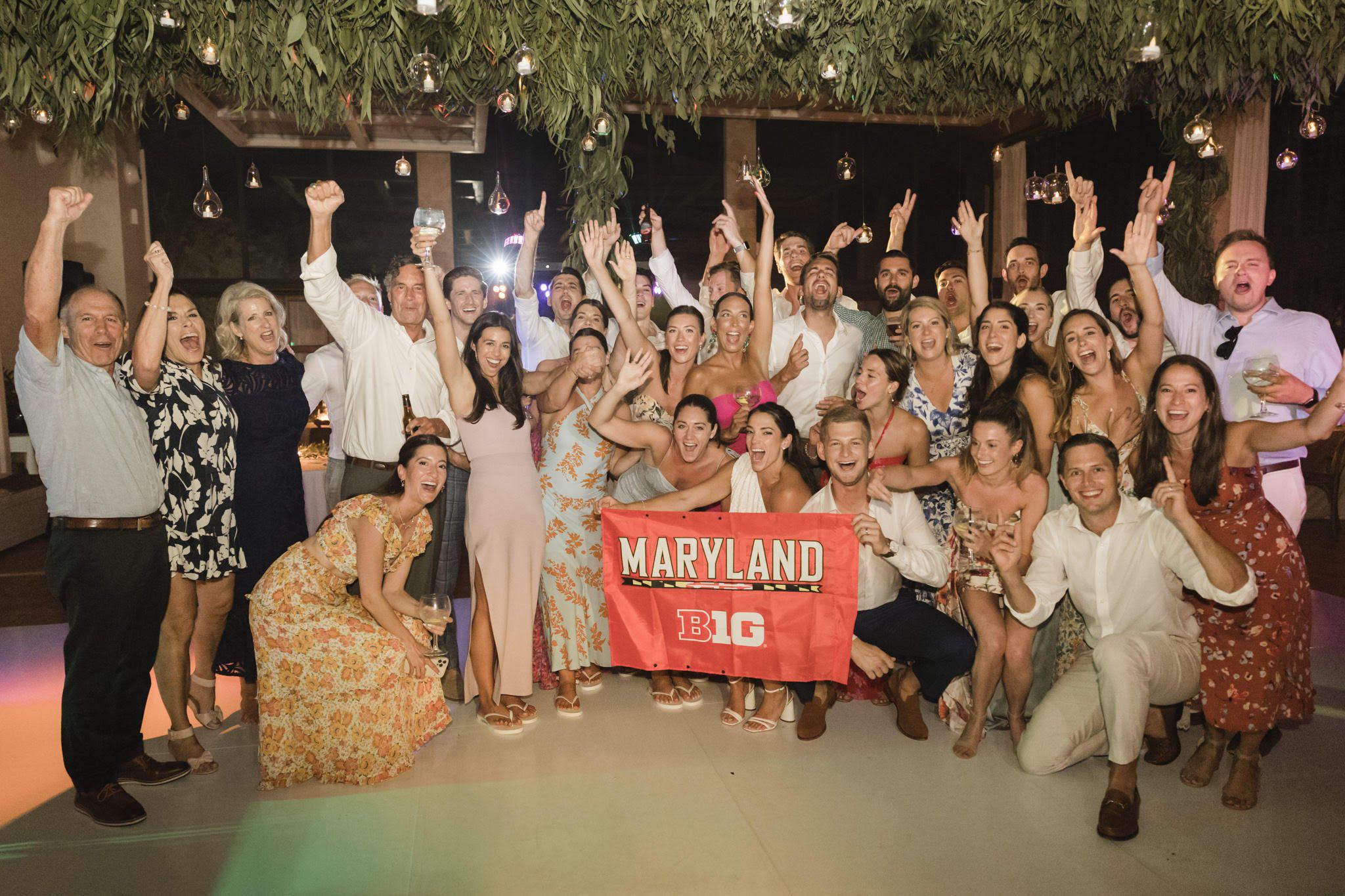 Cristina Meneses '15 and Ryan Aceto '14 celebrating with friends