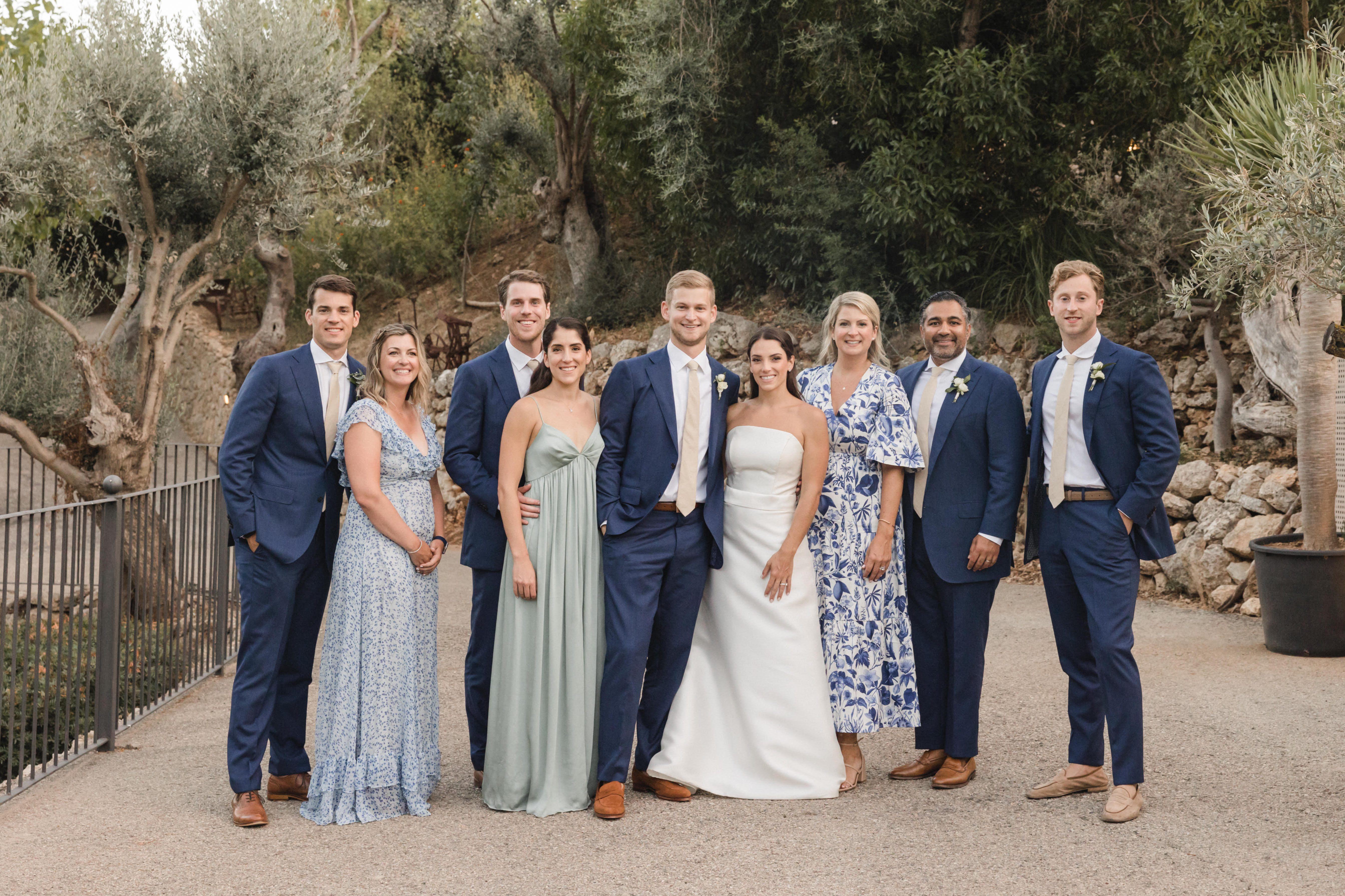 Cristina Meneses '15 and Ryan Aceto '14 pose with family at their wedding