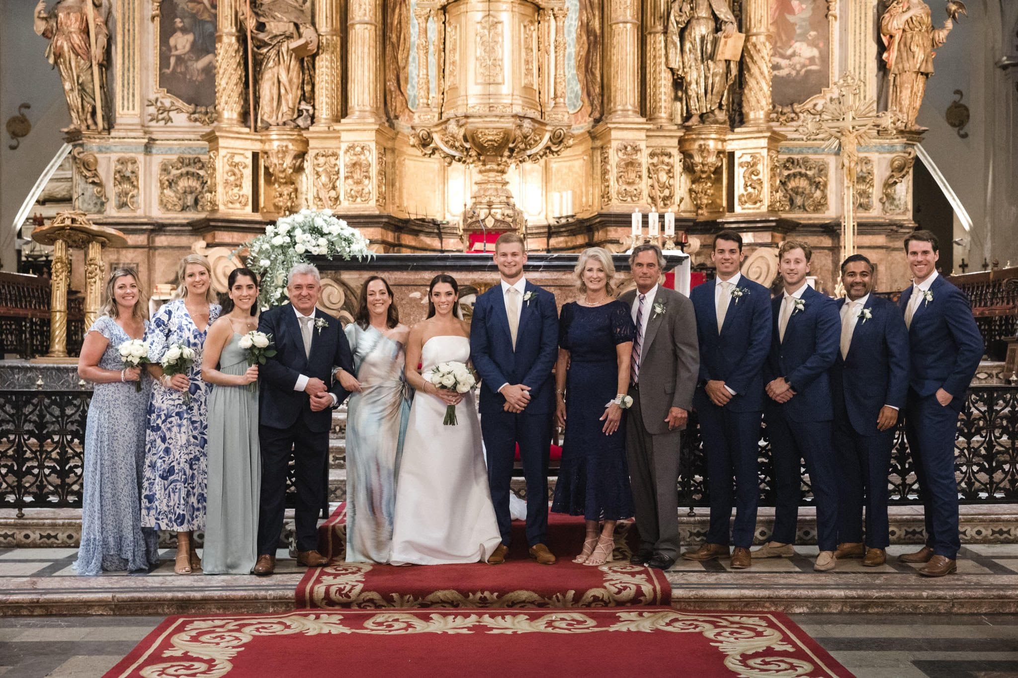 Cristina Meneses and Ryan Aceto pose with their family at their wedding in Spain