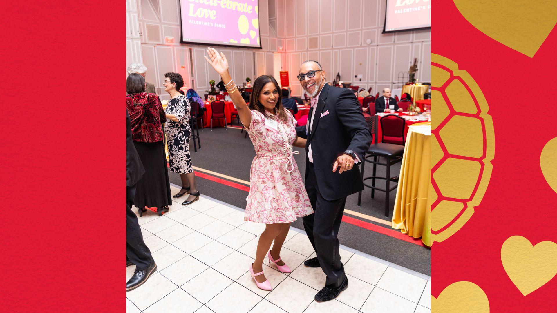 Terp couple poses on dance floor