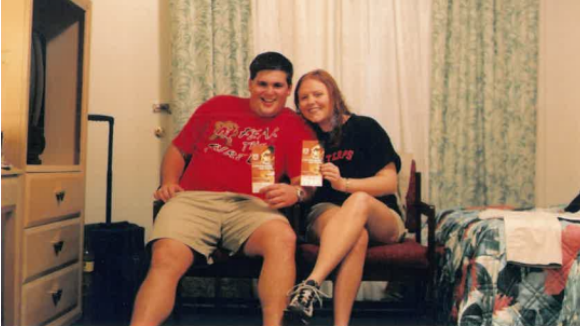 Faded photo of Chad and Jessica Roberts in a dorm room