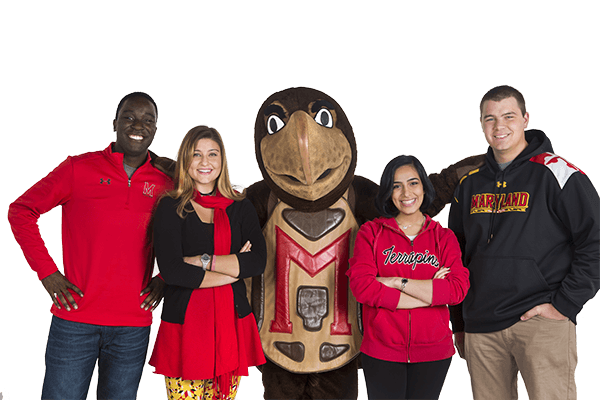 Group of four students posing with Testudo