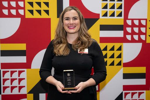 Maria Ball '12 accepts the Volunteer of the Year award